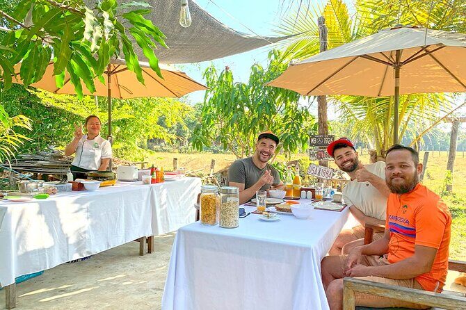 Angkor Sunrise Bike Tour - Breakfast & Lunch included - Angkor Thom’s South Gate and Bayon: carvings you can actually read