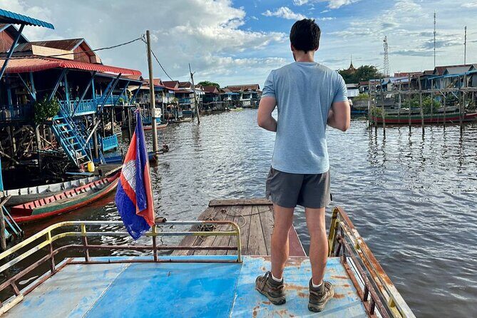Angkor Sunrise & Floating Village Sunset Full-Day Siem Reap Tour - Ta Prohm and Bayon: Tomb Raider roots and 216 smiling faces