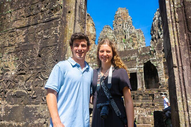 Angkor Sunrise Vespa Tour / Tuk Tuk or Car - Angkor Thom and Bayon: giant faces and a guided way to make sense of it