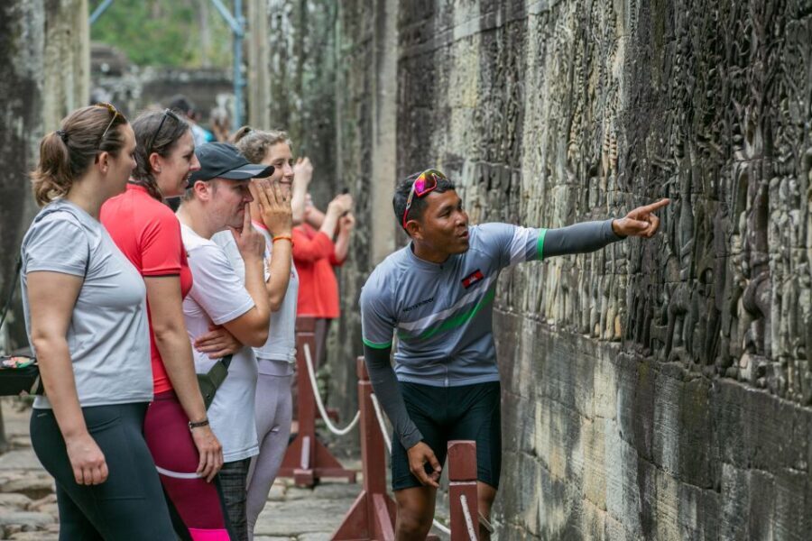 Angkor Wat: Guided Sunrise Bike Tour w/ Breakfast and Lunch - Biking behind Angkor Wat: the trails, villages, and the real appeal