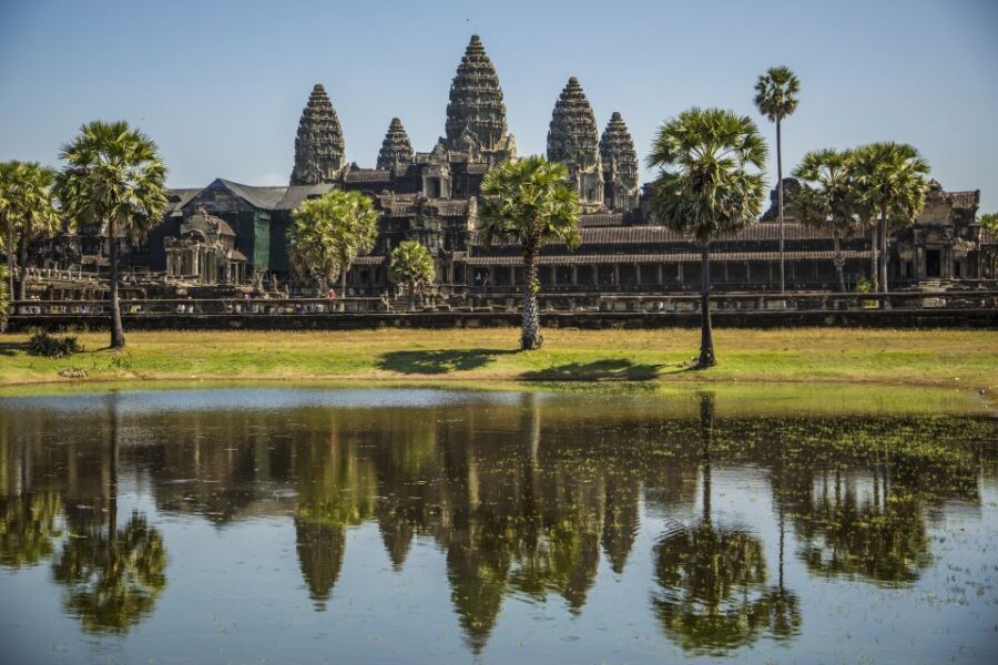 Angkor Wat in a vintage Jeep with driver - jeep rental - Ta Prohm (Tree Roots): When the Jungle Becomes Part of the Temple