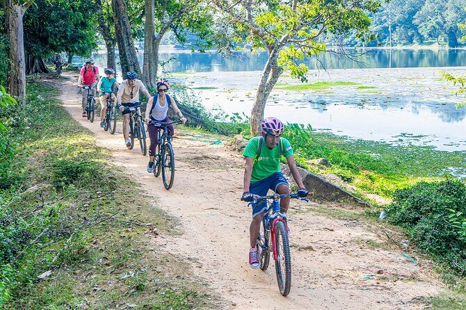 Cycle the Angkor Backroads with lunch / E-Bike or Tuk Tuk - Bayon and Angkor Thom through the gate with giant faces