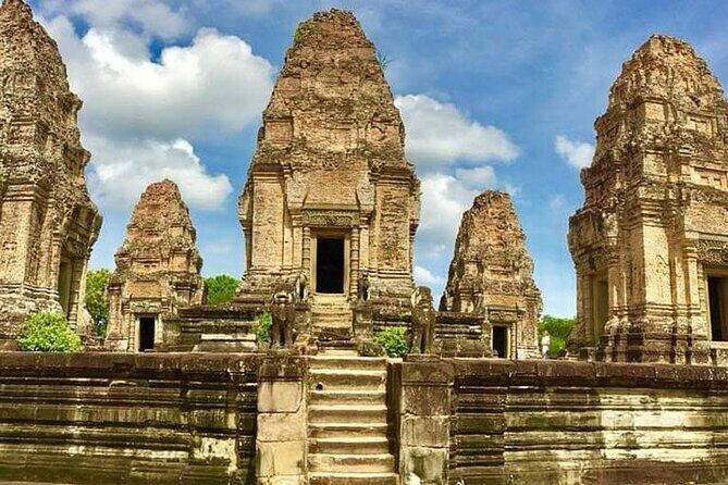 Private Day Angkor Wat Temple and Banteay Srei Temple Tour - Angkor Thom South Gate to Bayon: faces, causeways, and symbolism