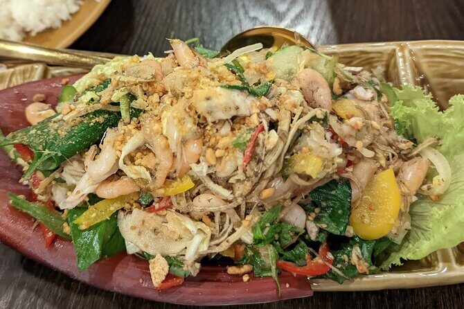 Siem Reap Food Tour By Local - Stop 4: Fermented fish on a cutting board at Old Market