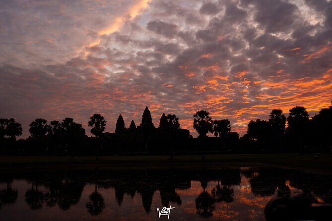 Sunrise Small Group Tour in Siem Reap - Angkor Wat at dawn: spires, symmetry, and photo-friendly pacing