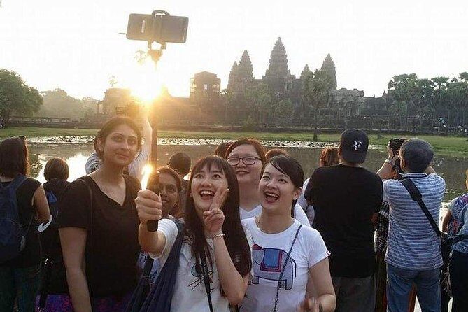 Sunrise Tour of Angkor Temples from Siem Reap - Moving through Angkor Thom to Bayon Temple