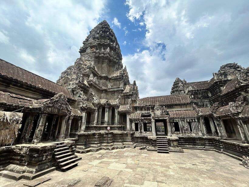 Small-Group Full Day Angkor wat Guide tour with Sun set - Ta Prohm: the temple where the jungle takes over