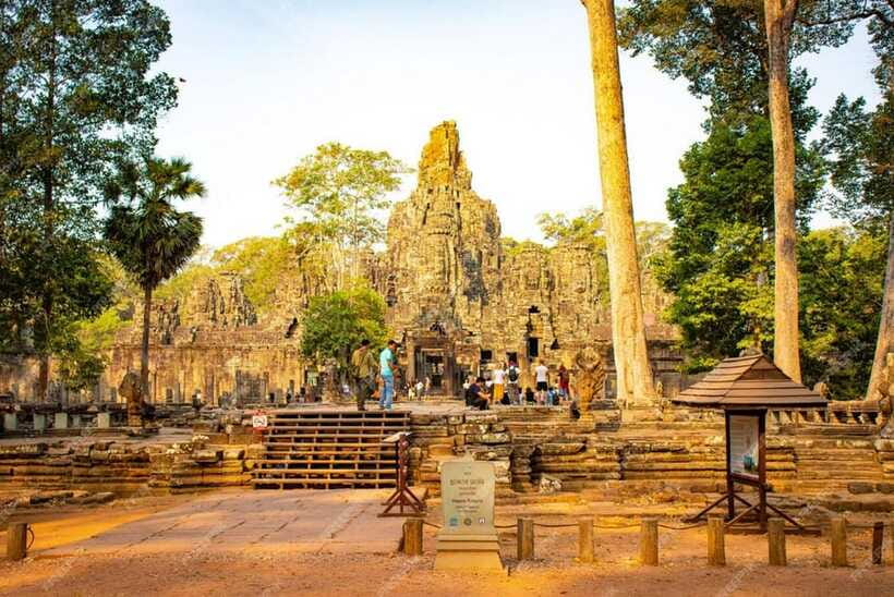 Sunrise at Angkor Wat and Small Tour with Tours Guide - South Gate to Bayon and Baphoun: the faces, the towers, and the story